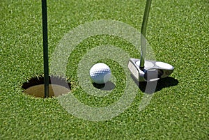 Golf ball on practice hole