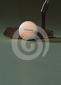 Golf ball and putter