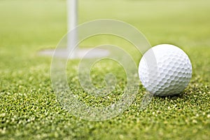Golf ball on a putting green