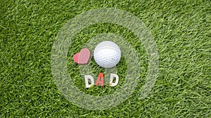 Golf ball with red heart and word DAD