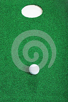 Golf ball short of hole