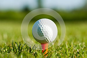 Golf ball on a tee