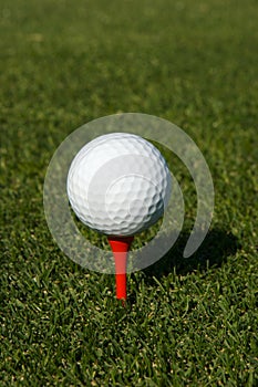 Golf ball on a tee