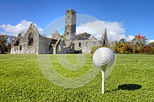 Golf ball on the tee in Adare, Ireland. photo