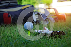 Golf ball on tee in a beautiful golf course