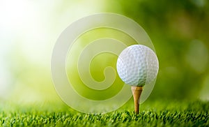 Golf ball on tee photo