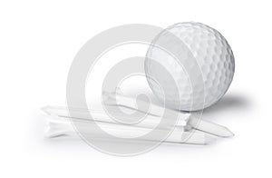 Golf ball and tees on white background