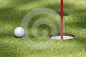 Golf ball towards the hole