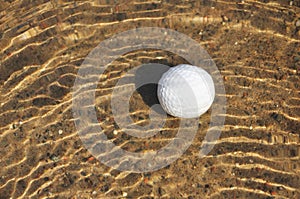 Golf Ball in a Water Hazard