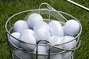 Golf Balls in Bucket on the Green