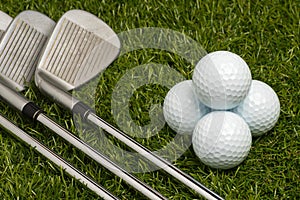 Golf balls and golf clubs