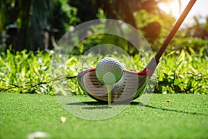 Golf balls on the golf course with golf clubs ready for golf in the first short. In the morning, with the beautiful sunlight.