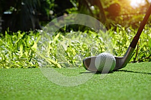 Golf balls on the golf course with golf clubs ready for golf in the first short. In the morning, with the beautiful sunlight.