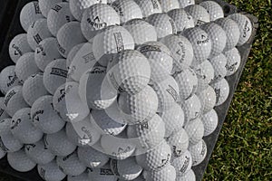 Golf balls pyramid on driving range