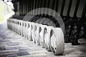 Golf buggies in a row.