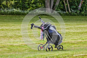 Golf caddy on a golf course