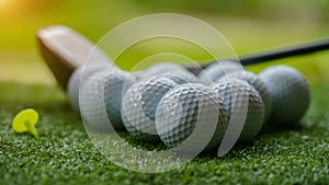 Golf club and ball in grass concept. Golf balls on the golf course with golf clubs