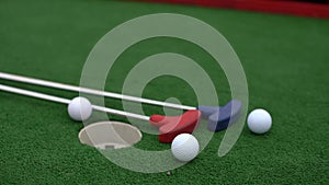 golf club, ball and hole