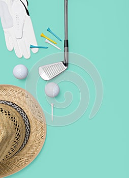 Golf club, golf ball, golf glove and tees on background in turquoise