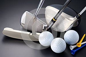 Golf clubs, driver, iron, putter, balls and tees.