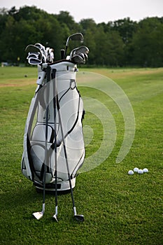 Golf-clubs with a golf-bag. Focus on bag