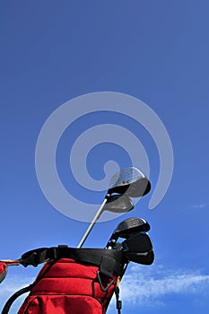 Golf Clubs in a Red Bag