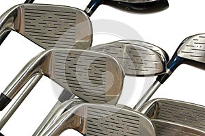 Golf clubs on white