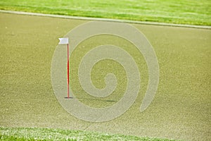 Golf course with artificial grass