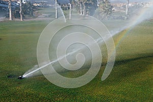 Golf course automatic lawn sprinkler