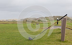 Golf course in autumn landscape