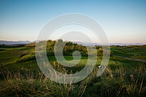 Golf course with collar at sunset