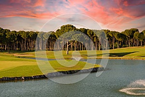 Golf course at sunset with beautiful sky