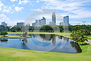 Golf Course Green with City Background