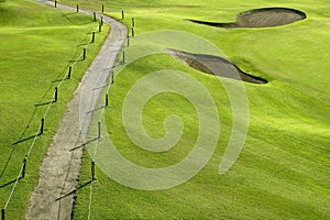 Golf course green grass hill field with holes