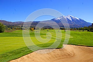 the golf course at lakewood country club with mountains in the background