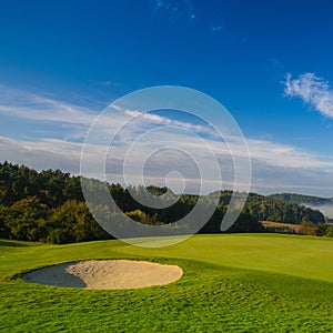 On a golf course in the morning