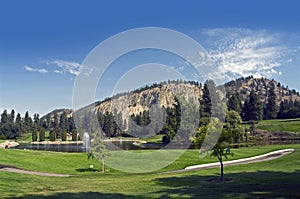 Golf Course by mountains