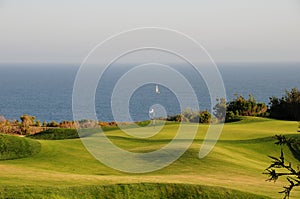 Golf course by ocean