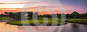 Golf course panorama at sunset with beautiful sky