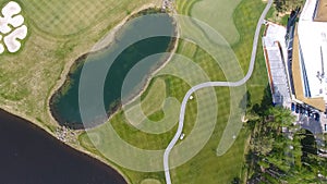 Golf course on a Sunny day, an excellent Golf club with ponds and green grass, view from the sky