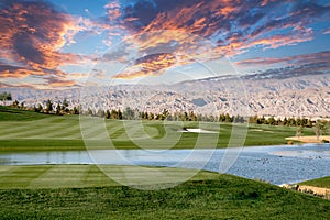 golf courseat sunset in palm springs, california