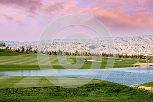 golf courseat sunset in palm springs, california