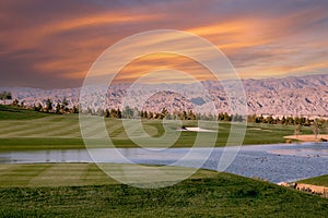 golf courseat sunset in palm springs, california