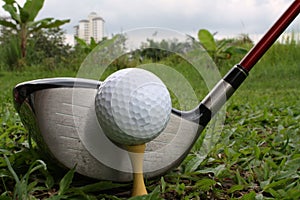 Golf driver and ball