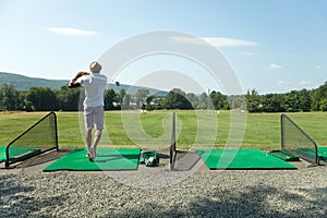 Golf at the Driving Range