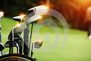 Golf equipment in beautiful golf course at sunset