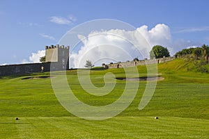 A golf fairway and green in the parkland course in the Roe river valley near Limavady in Northern Ireland