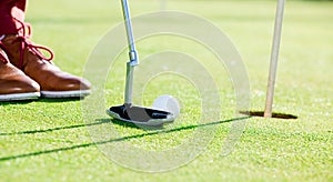Golf game requires hard trainings to propel ball towards hole