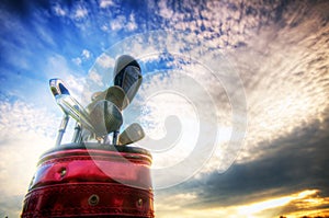 Golf gear, clubs at sunset