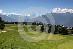 Golf hole 8 in Crans Montana photo